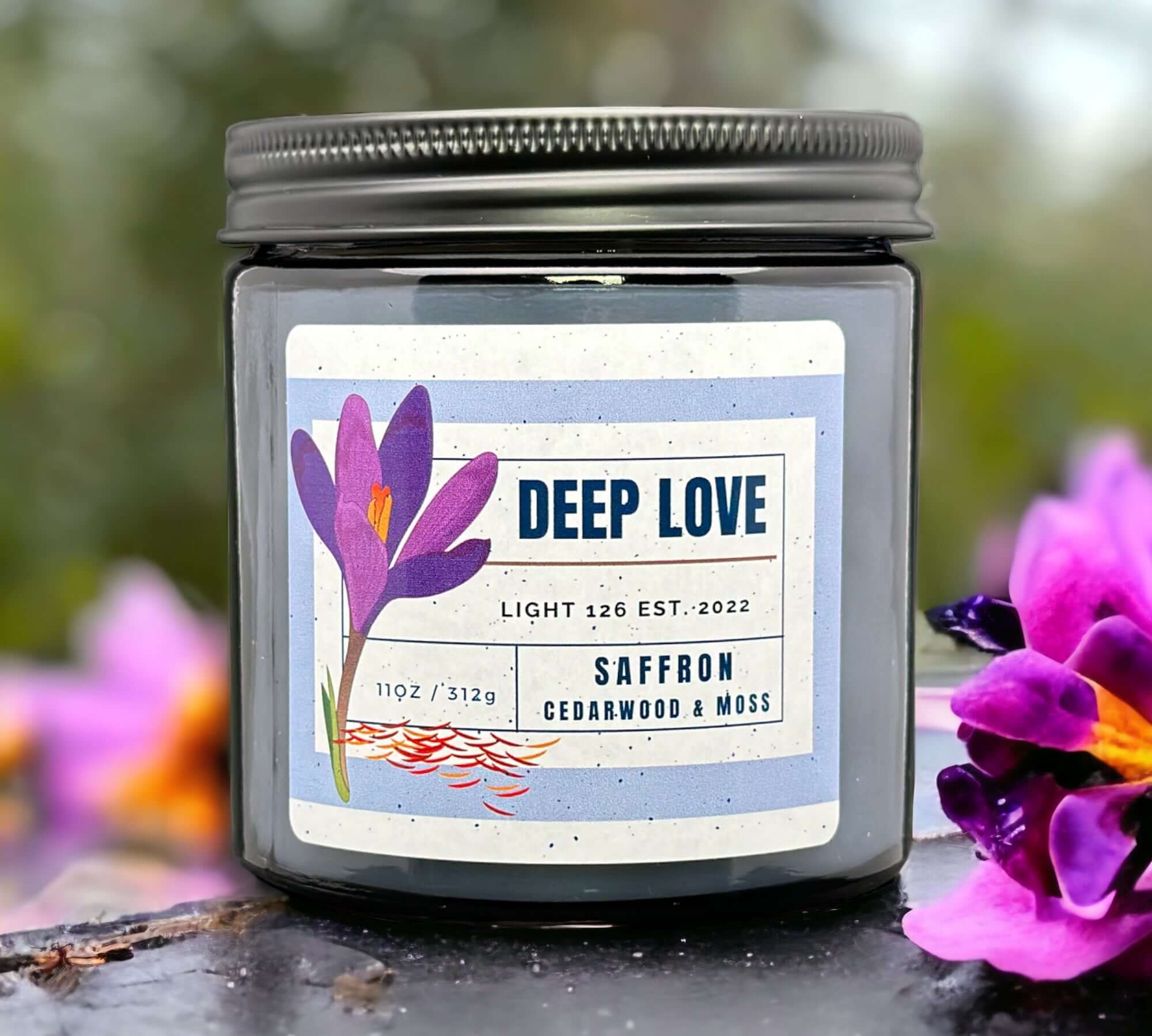 Deep Love scented candle. Saffron cedarwood and moss fragrance.